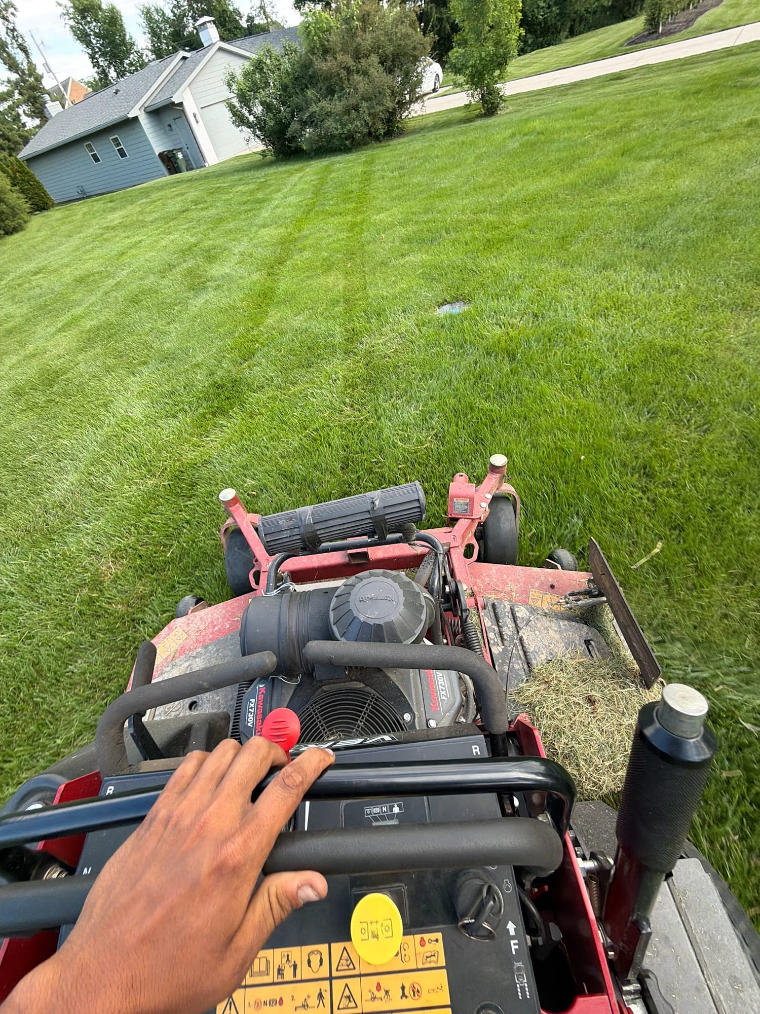 Mowing in progress from the operator's view