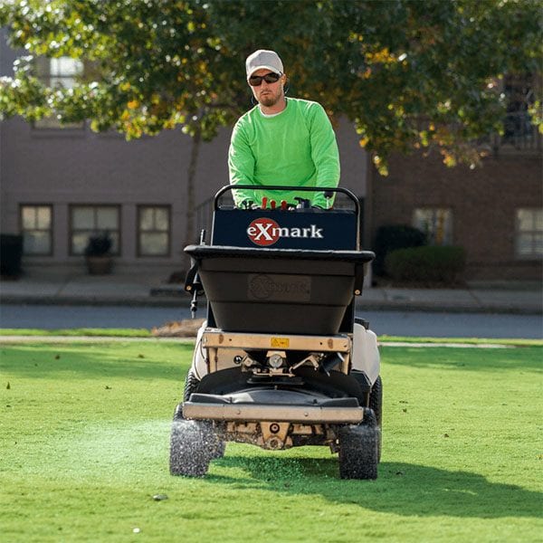 Applying fertilizer with a ride-on spreader